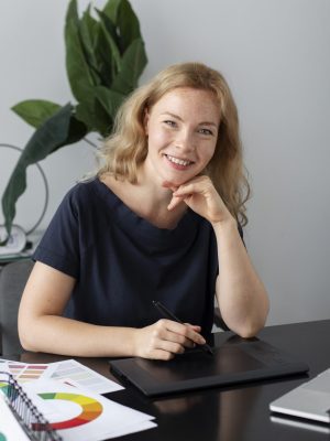 female-logo-designer-working-her-office-graphic-tablet